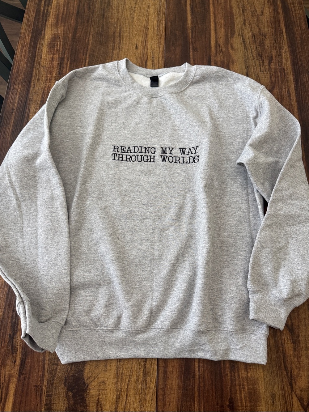 Bookish Crewneck Sweatshirt "READING MY WAY THROUGH WORLDS" Embroidered